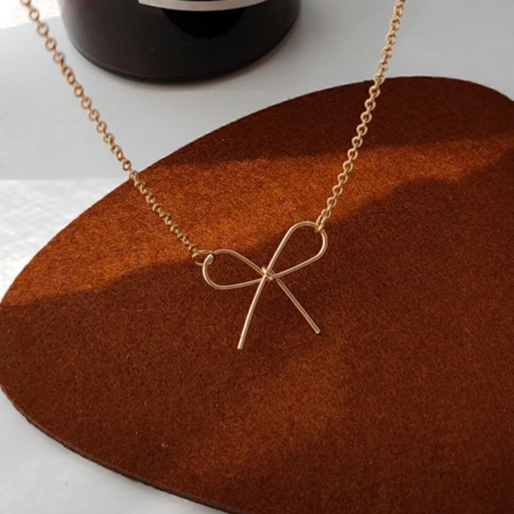 NWT dainty necklace bow zinc allow